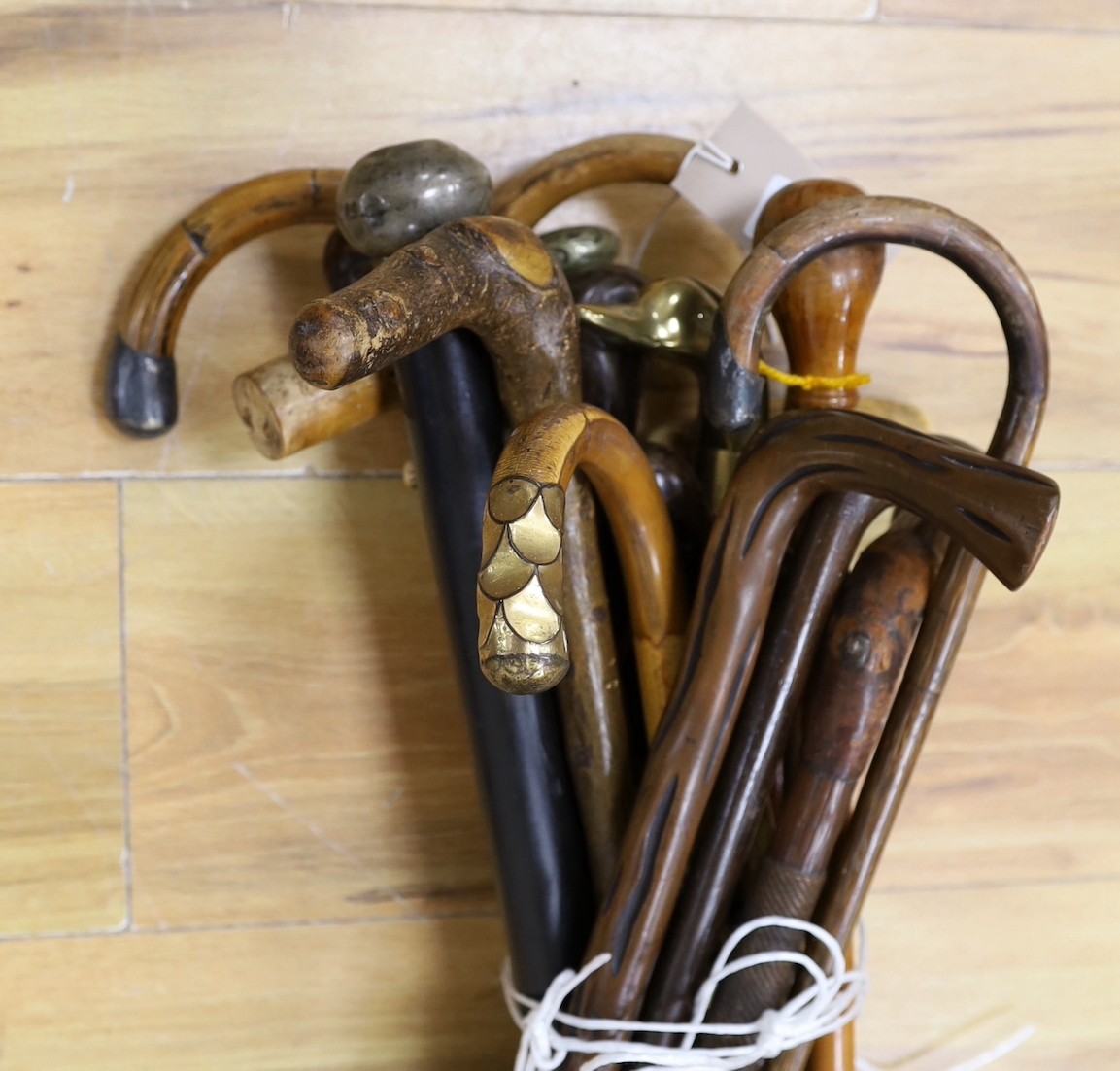 An assortment of walking sticks / canes